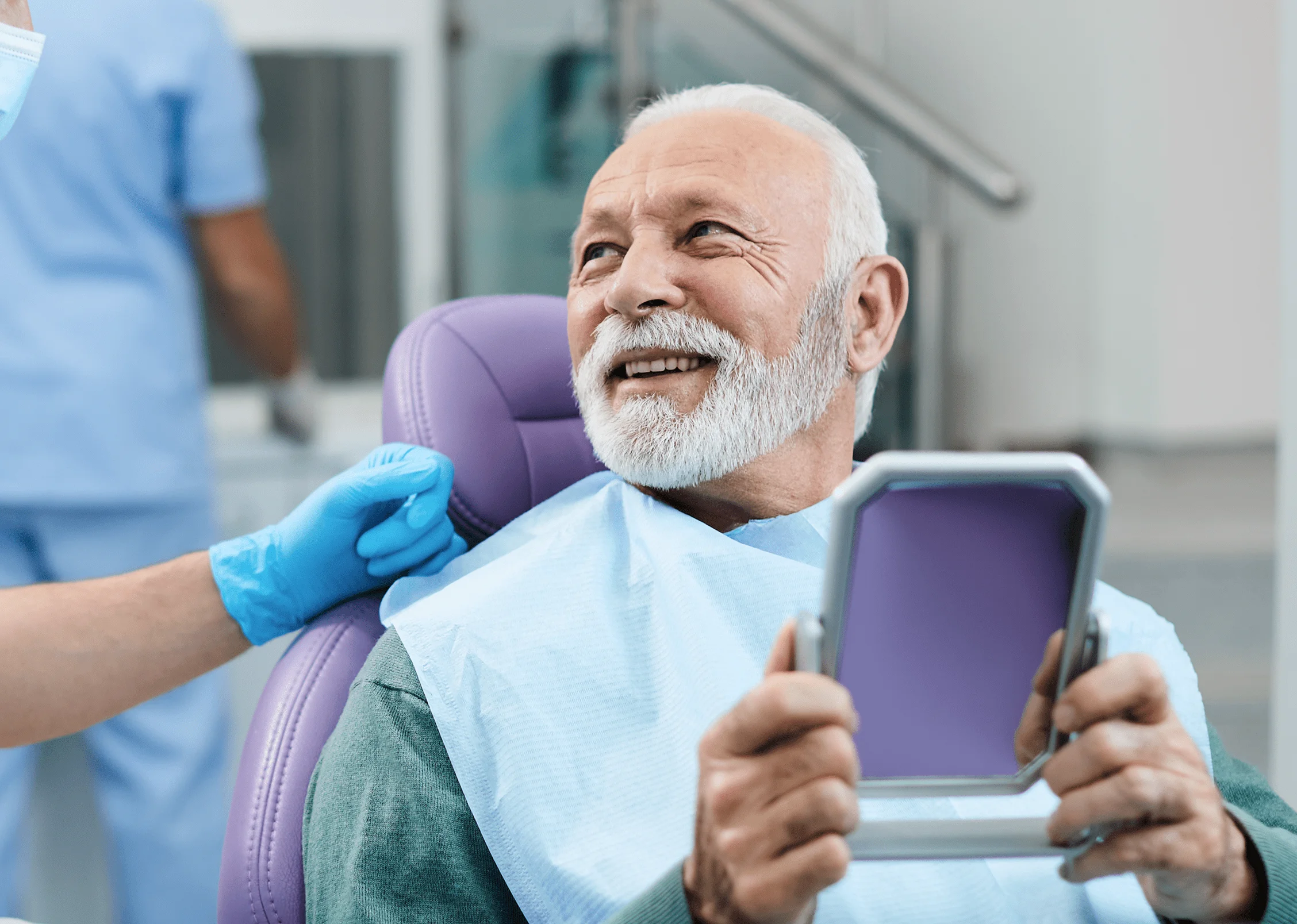Happy patient smiling after a visit to Taverham Dental
