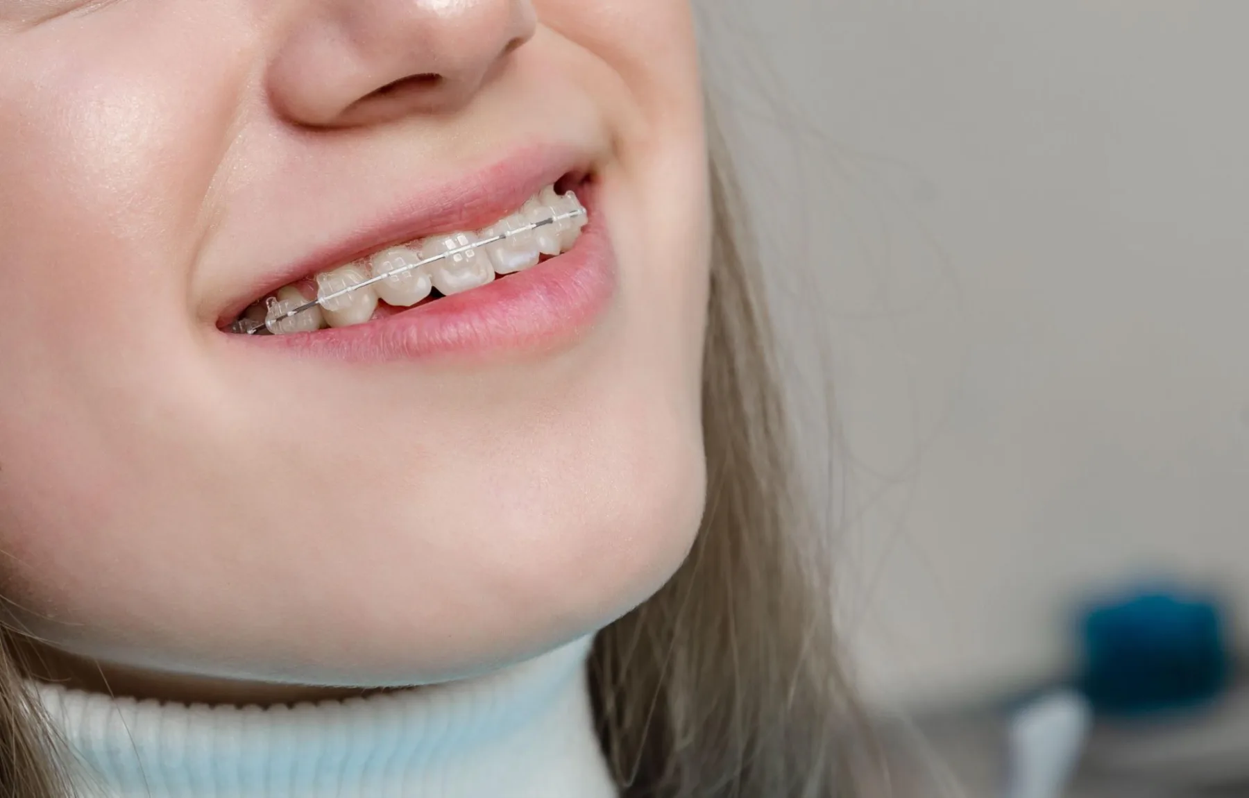 Patient with braces fitted seeing a dentist for a check-up